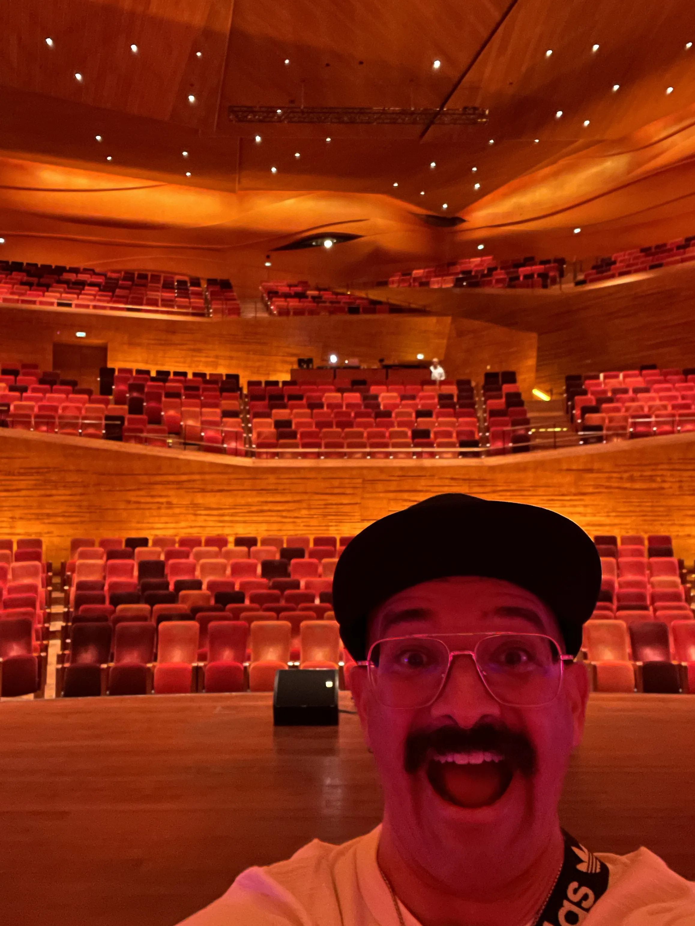 Image showing faces of comedians, and information about the comedy show