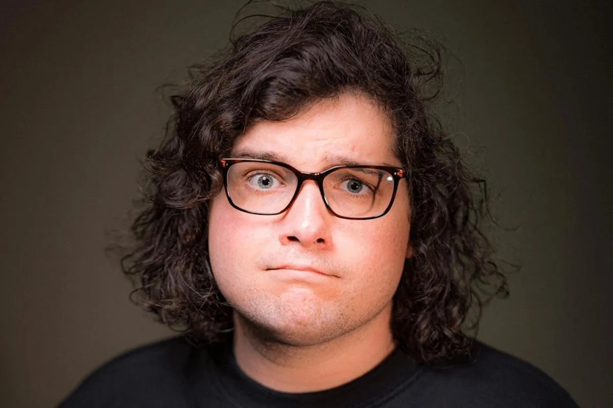 Image showing faces of comedians, and information about the comedy show